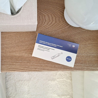 Obenansicht der Packung Kochsalzlösung von IEA Medical