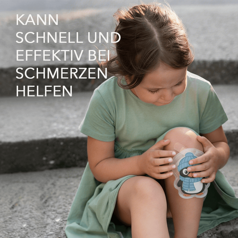 Kind hält pinguinförmige Kompresse ans Knie, Bildtext nennt Einsatz bei Schmerzen.
